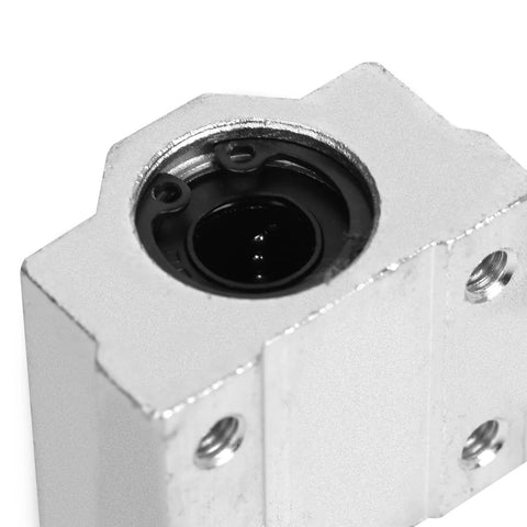 Close-up view of 4 Pack SCS10UU Linear Motion Ball Bearing Slide Unit with aluminum housing and 10mm inner diameter for CNC machines and 3D printers.