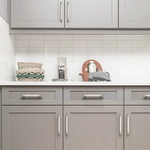 Installed 20 Pack Solid Zinc Alloy Cabinet Handles In Brushed Nickel, 3 Inch Center To Center, on grey kitchen cabinets.