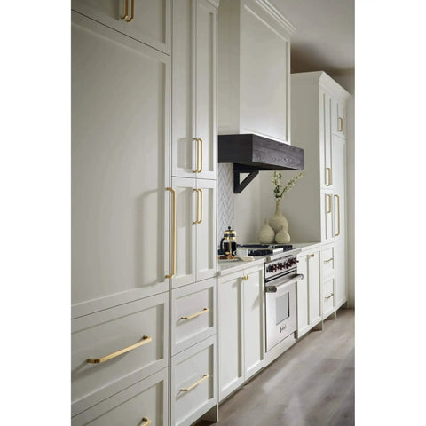 Davenport Honey Bronze Cabinet Pull 5-1/16 Inch Center To Center installed on white kitchen cabinets for a timeless finish.