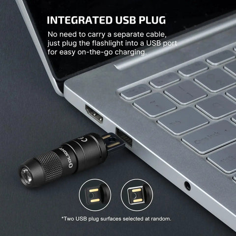 Imini 2 EDC Rechargeable Keychain Flashlight With 50 Lumens Output plugged into USB port for charging