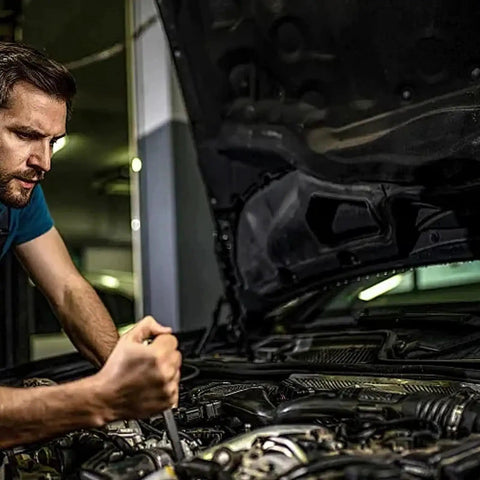 Mechanic under car hood using multi-size 1/4/3/8/1/2 inch drive converter sleeve adapter (machined alloy)