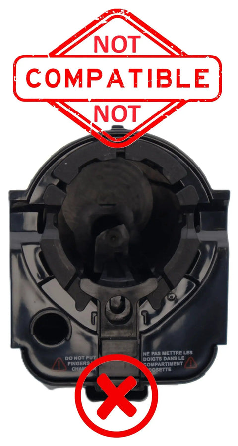 Black plastic K-Cup pod holder insert with exit needle for Keurig K-series coffee makers; not compatible stamp visible