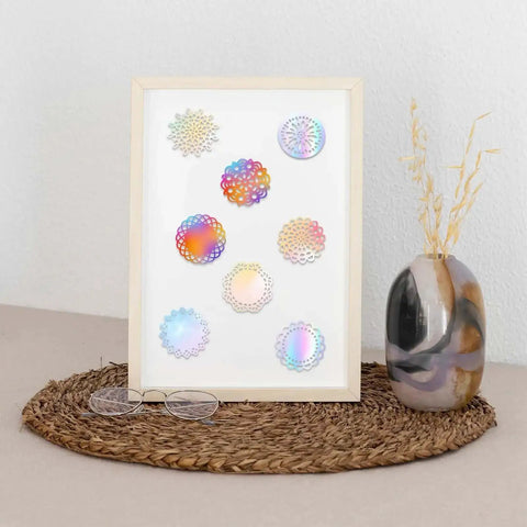 Display of 8 pattern round lace border die set for card making and paper crafting with dope floral motifs in silver finish