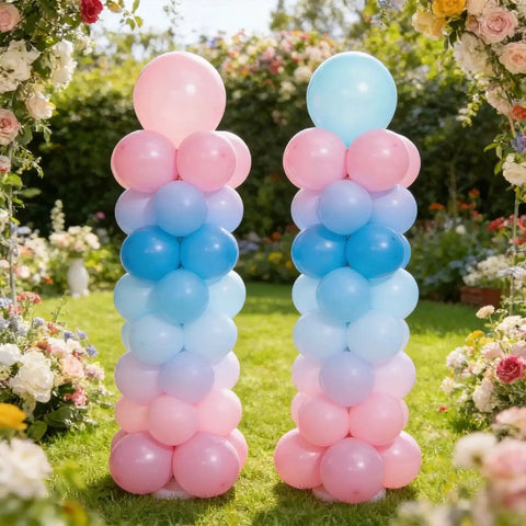 12Ft Table Balloon Arch Kit With Column Stand For Parties Birthday Wedding, showing pink and blue balloon columns in a garden setting.