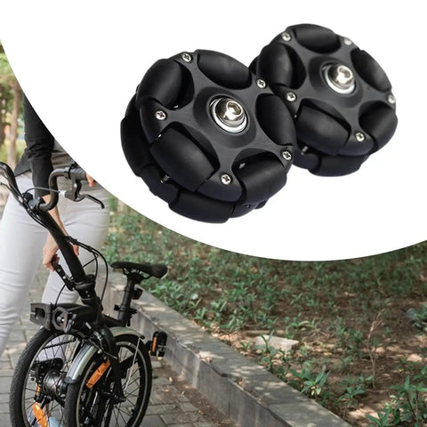 58mm Omni Directional Folding Bike Roller Replacement Wheels with nylon core and aluminum bearing in use on a folding bike