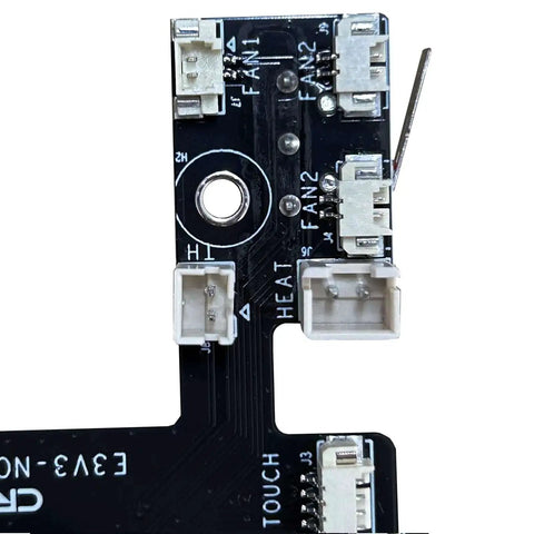 Close-up of Ender 3 V3 KE Hotend Adapter Plate With E3V3 Nozzle V1.6 PCBA Breakout Module, showing circuit connections.