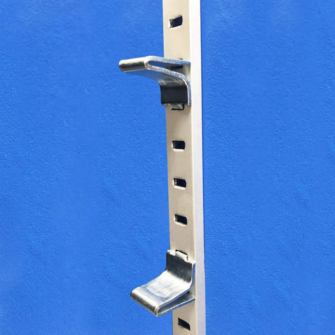 Adjustable Steel Pilaster Shelf Support Clips Set of 14 with Zinc Finish for Standard Shelving Systems installed on blue wall.