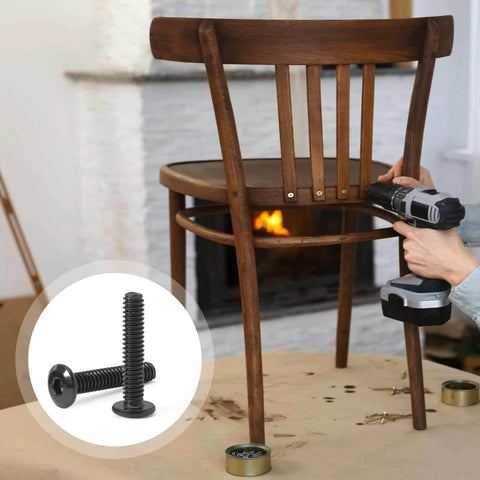 Person assembling chair with drill, inset of 30 Pack Flat Head Allen Bolts For Furniture With One Quarter Twenty Thread And One Quarter Inch Length Black Carbon Steel Socket Cap Screws Built Tough, Rust Resistant Heavy Duty High Hardness Durable For Cabinets Desks Shelves And DIY Projects.