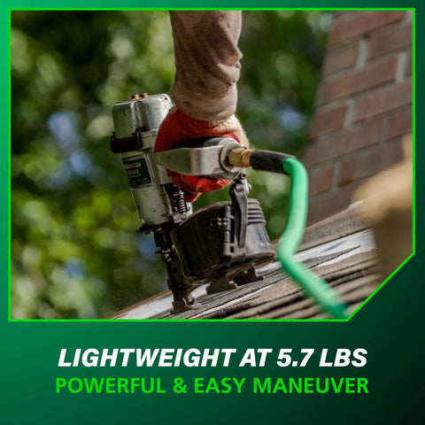 Person using Pro-Grade Pneumatic Roofing Nailer for Asphalt Shingles, installed on roof, driving nails with green hose attached.