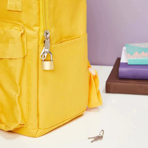 Two Pack Small Solid Brass Padlocks With Keys 20mm And 25mm Mini Key Locks for luggage security on yellow backpack zipper
