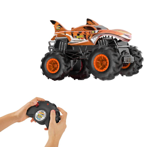 Monster Trucks RC Tiger Shark One Twenty Four Scale Remote Control Truck With Terrain Action Tires shown with controller