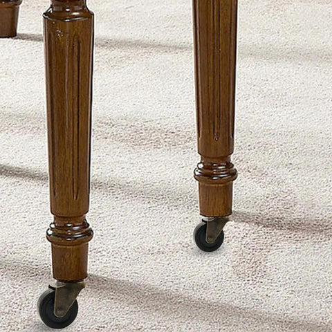Antique Brass Caster Wheels Set Of Four With Rubber Wheels And Five Sixteenth Inch By One And One Half Inch Stem Sockets installed on furniture