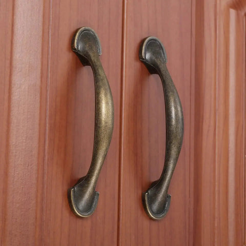Antique Bronze Cabinet Pulls Set Of 4 Arch Style Kitchen Cabinet Handles installed on wooden doors, 116x22mm, zinc alloy.