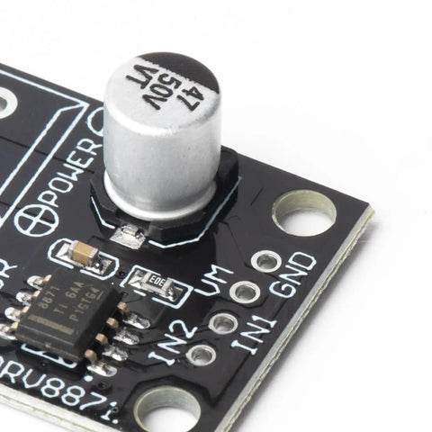 Close-up of 4 Pack Brushed DC Motor Driver Module with PWM control, DRV8871-based H-Bridge for robotics, capacitor and IC visible