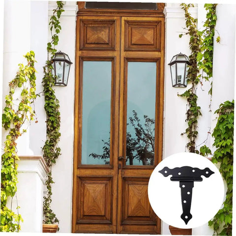 Black Painted Wrought Iron Strap Door Hinge Heavy Duty T Strap Decorative Hardware for Doors displayed on wooden door by Hakidzel