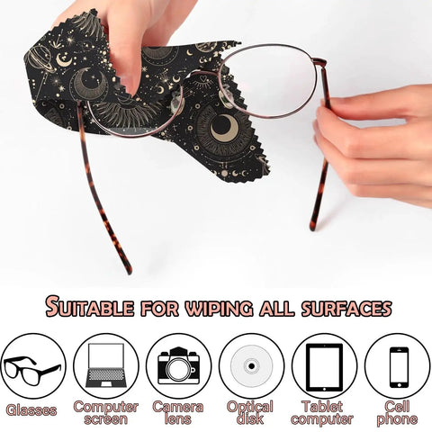 Person using Six Pack Microfiber Cleaning Cloths For Eyeglasses And Devices Moon Star Pattern on glasses