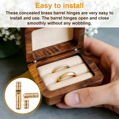 Open wooden box with concealed brass barrel hinges for jewelry, showcasing smooth ring display. 25 Pieces Brass Barrel Hinges For Wooden Boxes And Jewelry Boxes Concealed Hidden Cylindrical Hinges 2x0.4 Cm Durable Cabinet Door Hardware For Small Woodworking Projects And Model Making is shown in use.