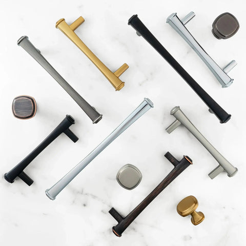 Assorted cabinet pulls and handles, including 96mm Antique Silver Cabinet Pulls 3 3/4 Inch Pewter Dresser Drawer Handles Set of 10, on marble surface.