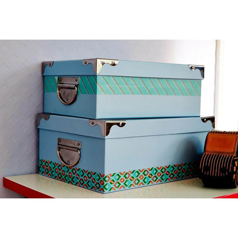 Blue storage boxes decorated with Expressions Washi Tape Blue, 0.59 In wide, repositionable, for crafts and home décor projects.