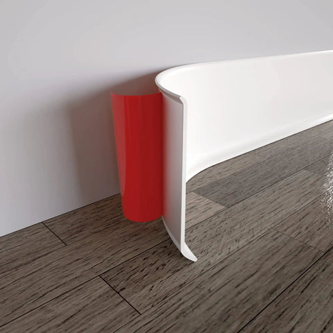 Self Adhesive Vinyl Wall Base Molding 4 Inch Wide 20 Feet White Peel And Stick Cove Base No Glue Needed Easy Install Durable Vinyl Trim COUKIU, white trim installed against floor.