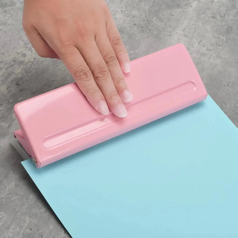 Adjustable 6 Hole Punch For A4 A5 A6 Personal And Pocket Planners Durable Metal Construction With Non Slip Base in use