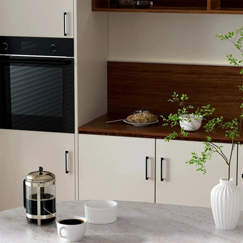 Modern kitchen with cabinets featuring 5 Inch Cabinet Pulls 10 Pack Square Zinc Alloy Drawer Handles in black and brushed nickel.