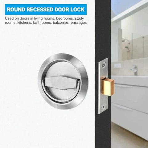 Round recessed door lock installed on a black door, visible in bathroom setting