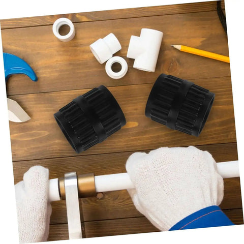 Two Piece Tubing Deburring Tools Reamers For Pipes Set on wooden table with plumbing materials