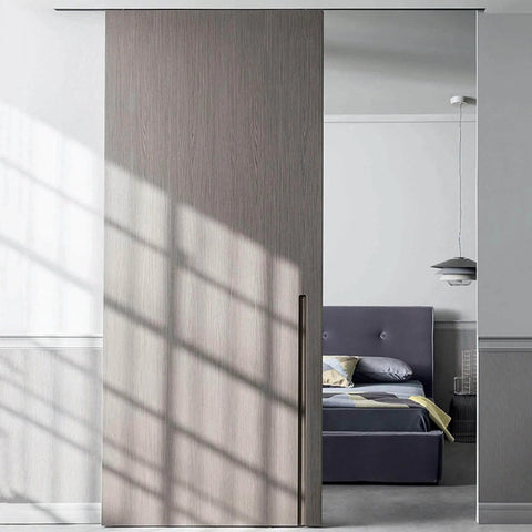 Heavy Duty Aluminum Pocket Door Hardware Kit With Quiet Rollers installed in bedroom with ceiling mount sliding barn door track