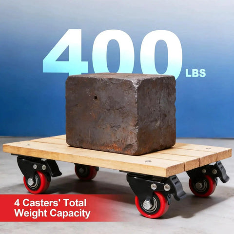 Front view: four red polyurethane swivel caster wheels with brakes under a wooden pallet supporting a rusted block