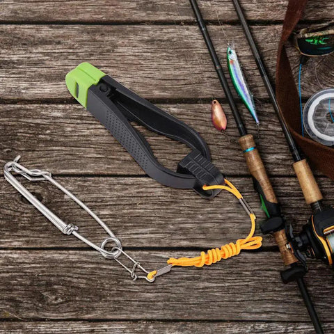 Board Mast Release Snap Clip Clamp For Downrigger And Outrigger Boat Fishing with fishing rods on a wooden surface