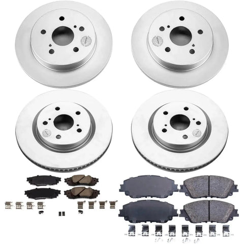 PowerStop front and rear brake kit showing four silver rotors, ceramic pads, and mounting hardware