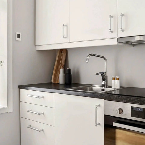 Modern kitchen with cabinets fitted with 10 Pack 5 Inch Hole Centers Polished Chrome Cabinet Pulls, polished finish