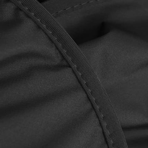 Close-up of R1S Roof Sunshade Two Piece Full Blackout for Rivian R1S showing black fabric material and stitching detail.