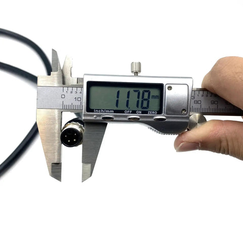 Measuring M12 5 Pin L Code Rail Transit Power Connector Cable diameter with caliper showing 11.78mm