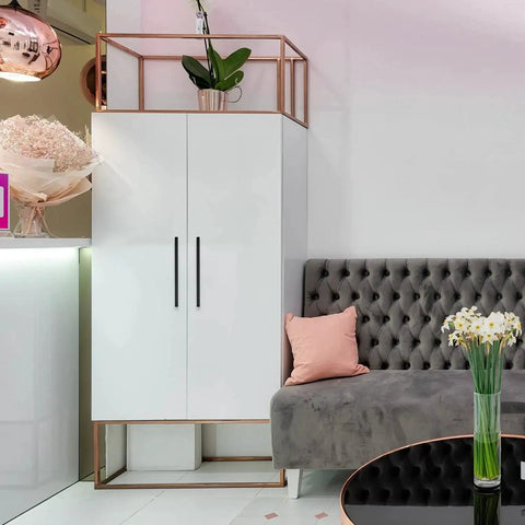 Stylish room with modern white cabinet featuring matte black 10 inch square cabinet pulls for kitchen cabinets and drawers.