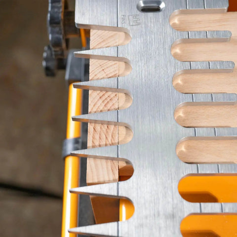 Close-up of a 12 Inch Dovetail Jig With Templates, Router Bits, And Guide Bushing For Half Blind And Through Dovetails, Box Joints