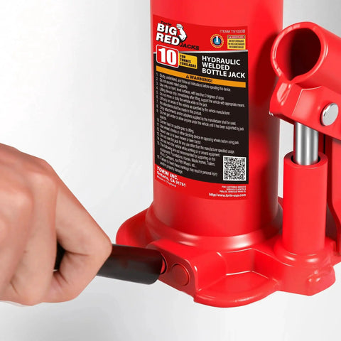 Close-up of 10 Ton Hydraulic Bottle Jack For Auto Repair And Home Lifts With Serrated Saddle in use