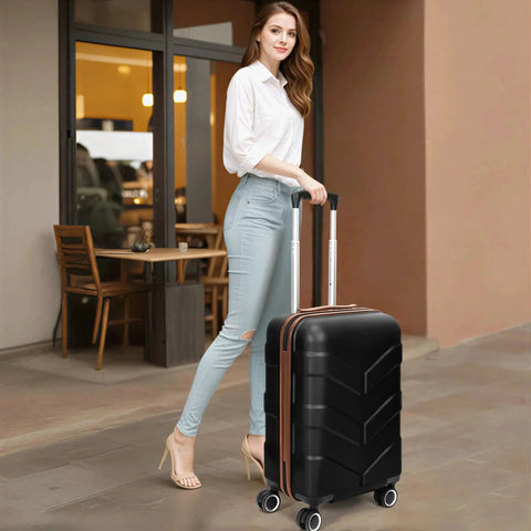 Woman walking with Three Piece Hardside Luggage Set With Spinner Wheels And TSA Lock Expandable 24 Inch And 28 Inch Luggage With Up To Twenty Percent Extra Space Plus 20 Inch Airline Approved Carry On Lightweight Travel Set For Men And Women Black