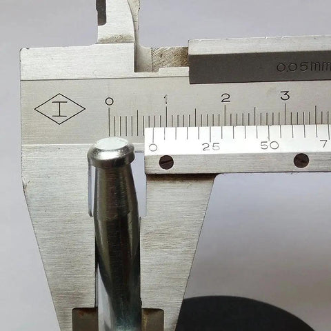Caliper measuring the stem diameter of Two Inch Stem Caster Wheels Set Of Five With Eight Millimeter Or Five Sixteenth Inch Stem Diameter.