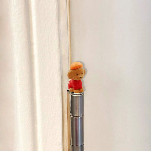 Whimsical Dog Themed Door Hinge Heads Set Of 6 Magnetic Toppers For Metal Surfaces installed on door hinge.