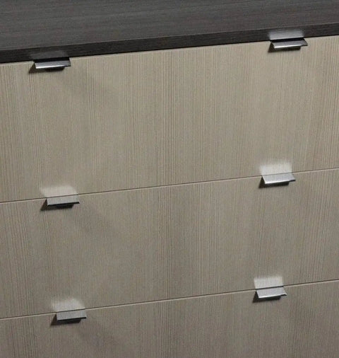 2 Inch Edge Pull In Polished Chrome For Cabinets And Drawers installed on furniture, showing modern sleek hardware upgrade in a kitchen or bath.