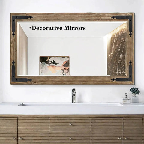 Decorative mirror with wooden frame and black corner accents above a bathroom vanity.
