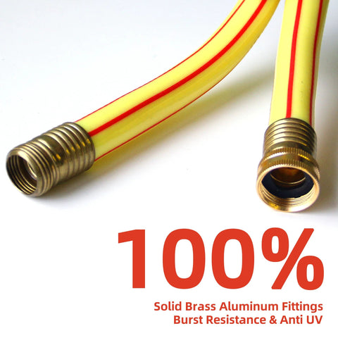 Close-up of a yellow garden hose with brass fittings and visible metal connectors