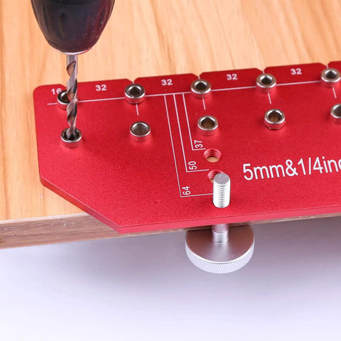 Close-up of 11 Hole All Metal Shelf Pin Jig With Self Contained Clamping For Easy No Fuss Drilling Drill Guide in use on wood