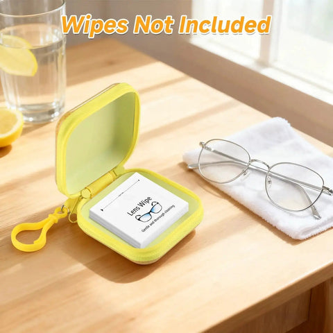 Open yellow tin case for Two Pack Portable Lens Wipes Tin Case For Eyeglasses Cleaning And Storage on table, wipes not included.