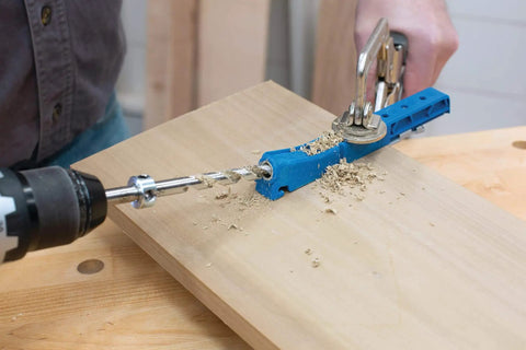 Using Pocket Hole Jig 310 Small Durable DIY Tool for Tight Spaces on wood, shown with drill for creating rock solid joints.