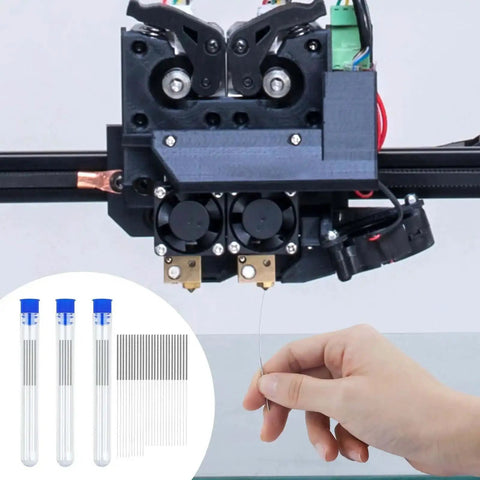 Hand using Essential 50 Piece 3D Printer Nozzle Cleaning Kit With 0.2mm 0.25mm 0.3mm 0.35mm 0.4mm stainless needles for maintenance