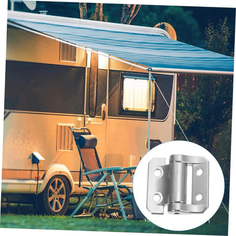 Close-up of heavy duty nickel damping cabinet door hinge with zinc alloy construction next to a campervan at night.