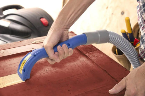 Using Viper Vacuum Scraper Attachment For Wet Dry Vacuums With Ergonomic Textured Grip to remove debris from a painted surface